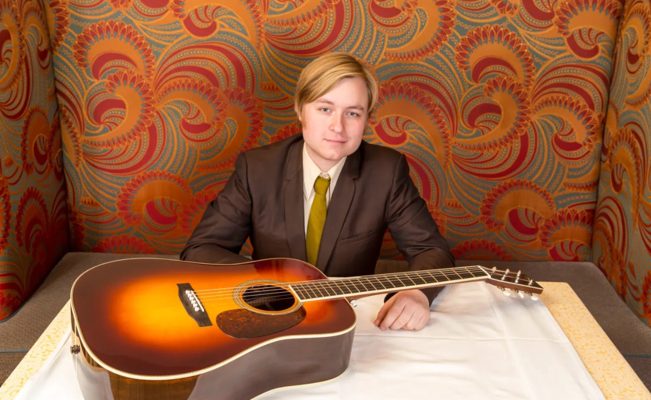 Chris Luquette with guitar